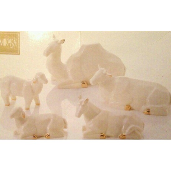 Large ivory porcelain nativity set with gold trim by miksa