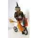 Vintage Primitive Folk Art HALLOWEEN GREEN WITCH on TRIKE by Sylvia Carlson.